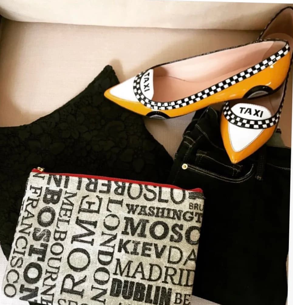 Tudaloo clutch styled with taxi print flats